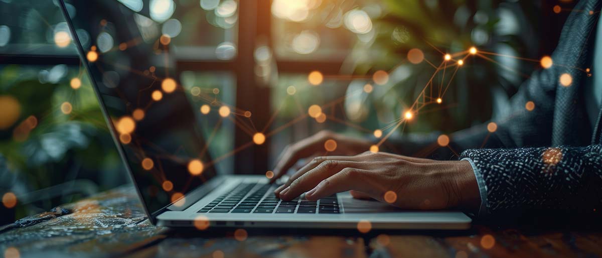 In this picture, a business man works on a blank screen laptop computer on a wooden desk as a concept with a social media diagram. Ai infused authenticity photo
